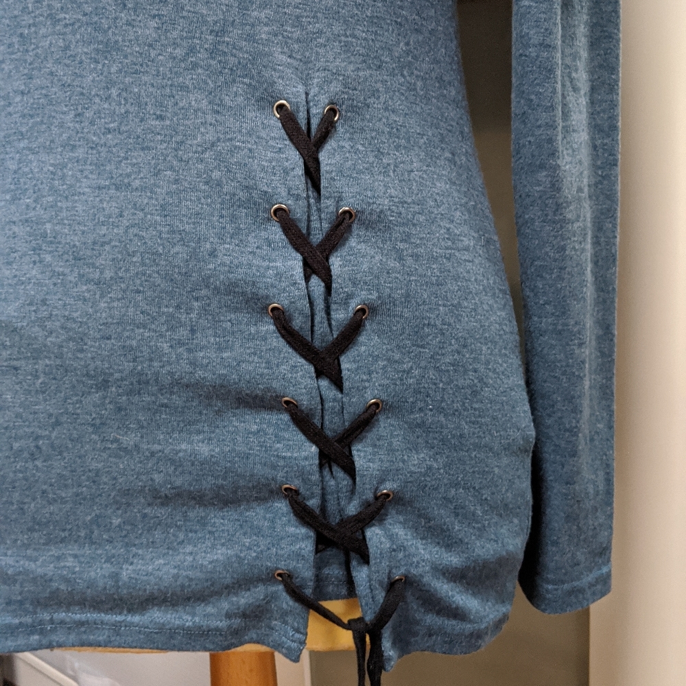 Tunic length form- fitting sweater